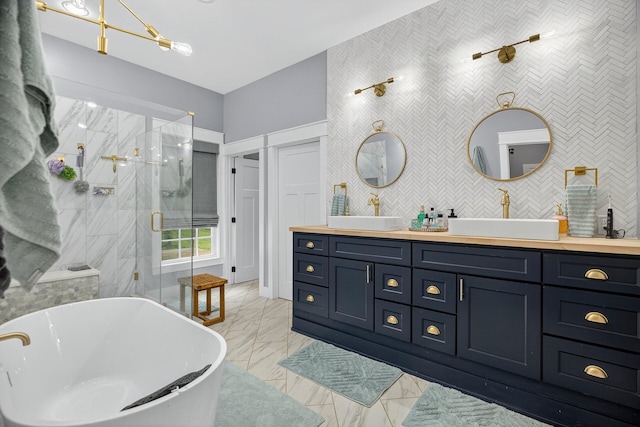 718 Mullins Dr, Sneedville, TN 37869 - full bath featuring marble finish flooring, a freestanding tub, double vanity, and a shower stall