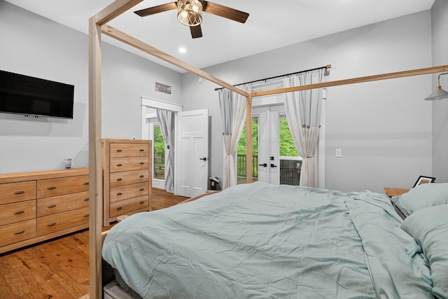 718 Mullins Dr, Sneedville, TN 37869 - bedroom with access to exterior, wood finished floors, multiple windows, recessed lighting, and a ceiling fan