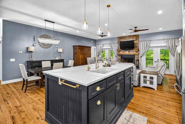 718 Mullins Dr, Sneedville, TN 37869 - kitchen featuring a ceiling fan, open floor plan, light wood-style floors, french doors, and recessed lighting