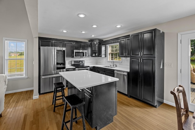 1790 Butterfly Ct, Whitesburg, TN 37891 - kitchen featuring stainless steel appliances, a sink, baseboards, dark cabinetry, and recessed lighting