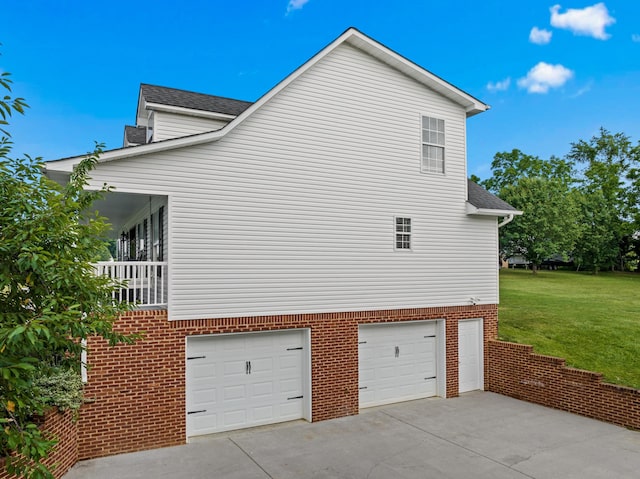 1790 Butterfly Ct, Whitesburg, TN 37891 - view of property exterior with driveway, an attached garage, a yard, roof with shingles, and brick siding