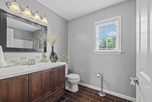 1790 Butterfly Ct, Whitesburg, TN 37891 - bathroom with toilet, vanity, baseboards, decorative backsplash, and curtained shower