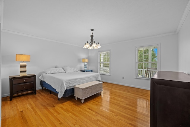 1790 Butterfly Ct, Whitesburg, TN 37891 - bedroom with ornamental molding, light wood-type flooring, a chandelier, and baseboards