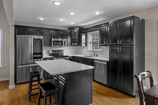 1790 Butterfly Ct, Whitesburg, TN 37891 - kitchen featuring appliances with stainless steel finishes, dark cabinets, a sink, and recessed lighting