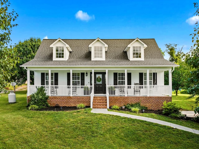 1790 Butterfly Ct, Whitesburg, TN 37891 - cape cod-style house featuring covered porch, a front lawn, and roof with shingles