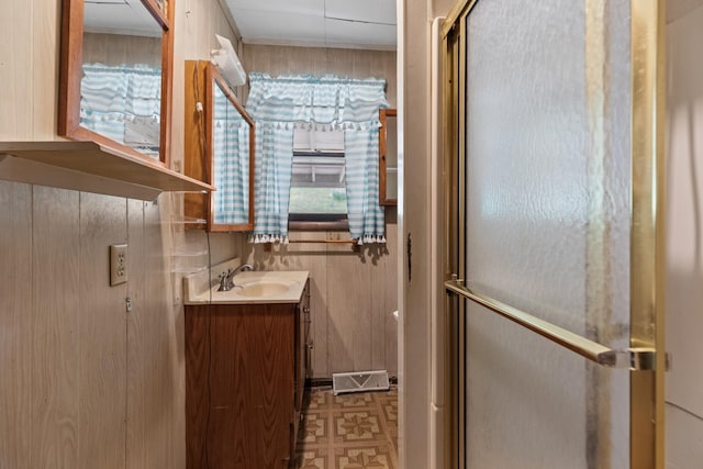 1900 Mountain View Ave, Kingsport, TN 37664 - full bathroom featuring a stall shower, tile patterned floors, and vanity