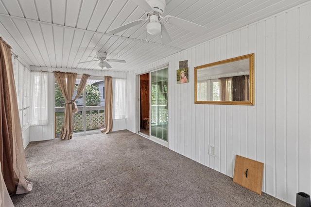 1900 Mountain View Ave, Kingsport, TN 37664 - unfurnished sunroom featuring carpet flooring and wood walls