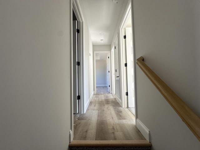 corridor featuring light wood-type flooring