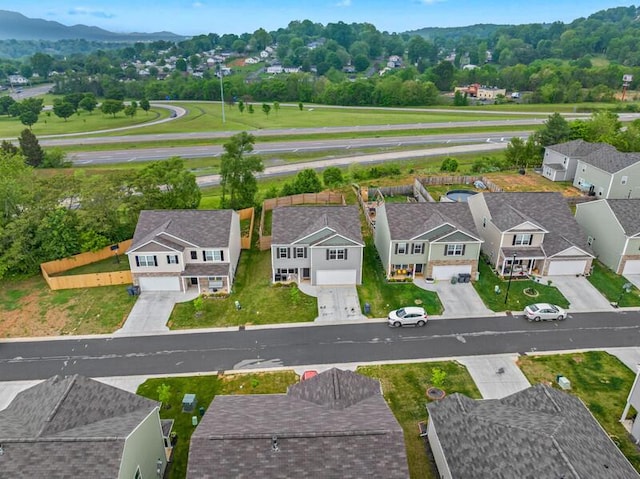 aerial view with a mountain view and a residential view