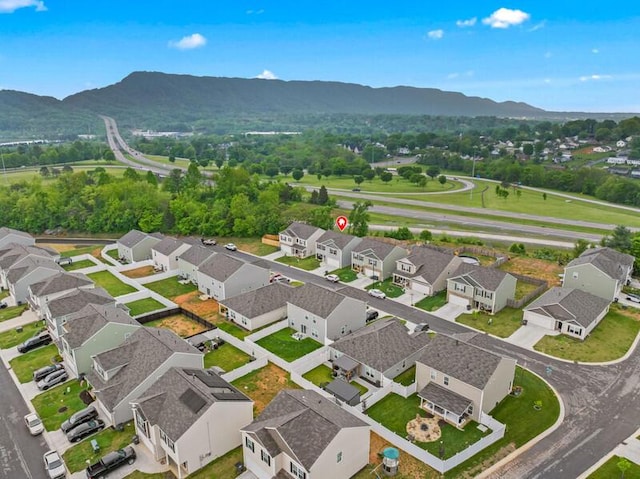bird's eye view featuring a mountain view and a residential view