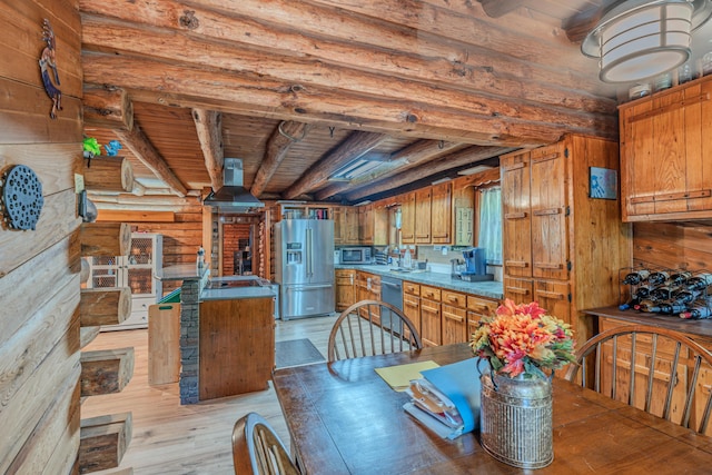 484 Buttermilk Rd, Blountville, TN 37617 - dining area with log walls, a wood ceiling with exposed beams, and light wood finished floors