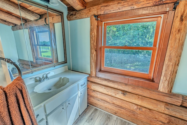 484 Buttermilk Rd, Blountville, TN 37617 - bathroom with vanity, beam ceiling, and wood finished floors