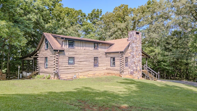 484 Buttermilk Rd, Blountville, TN 37617 - view of front facade featuring stairway, board and batten siding, log siding, and a front lawn