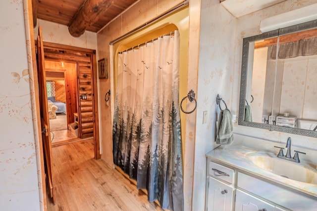 484 Buttermilk Rd, Blountville, TN 37617 - bathroom with wood finished floors, vanity, a wooden ceiling with exposed beams, and curtained shower