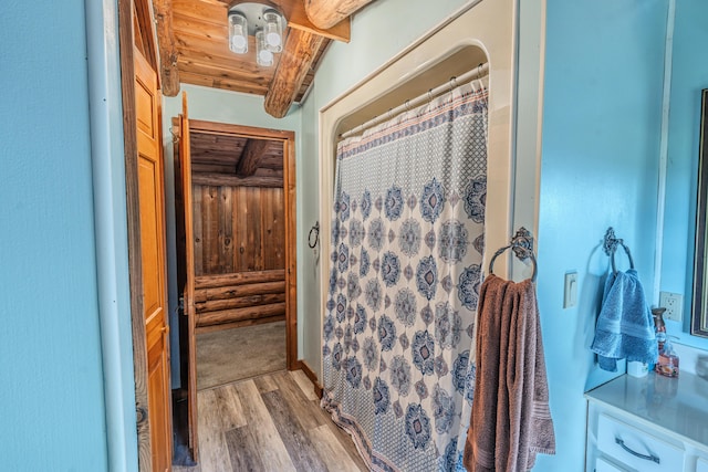 484 Buttermilk Rd, Blountville, TN 37617 - bathroom featuring wood finished floors, a shower with curtain, and a wood ceiling with exposed beams