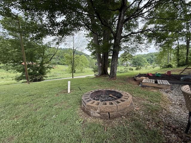 2466 Kidwell Ridge Rd, Morristown, TN 37814 - view of green lawn featuring an outdoor fire pit
