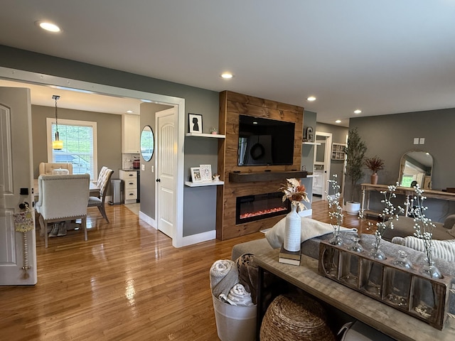 2466 Kidwell Ridge Rd, Morristown, TN 37814 - living room with a fireplace, wood finished floors, recessed lighting, and baseboards
