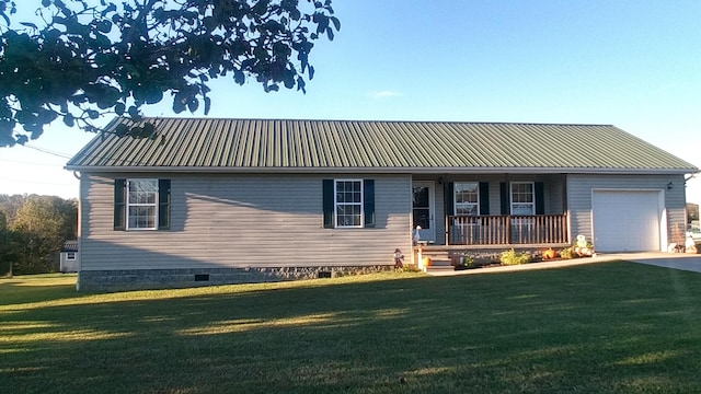 view of front of house with a front lawn, a porch, and a garage