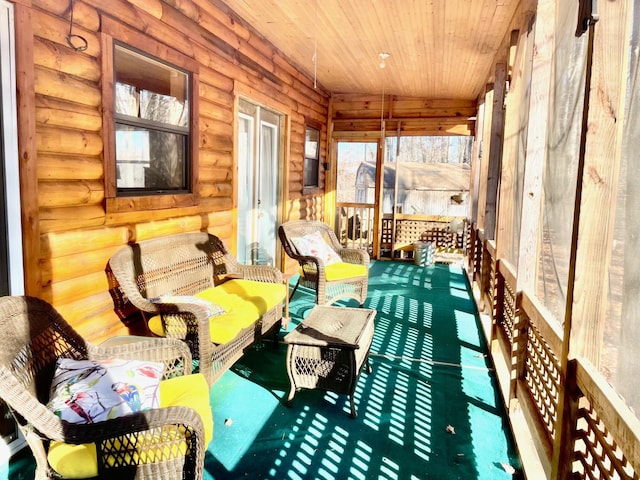 sunroom / solarium with wood ceiling