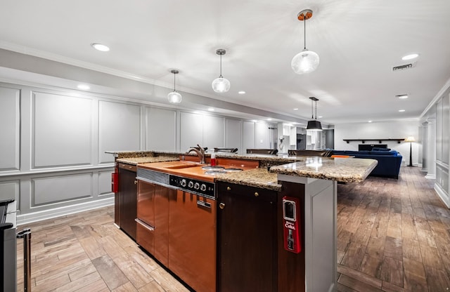 1442 Darbee Dr, Morristown, TN 37814 - kitchen featuring a decorative wall, ornamental molding, open floor plan, a large island, and light wood finished floors