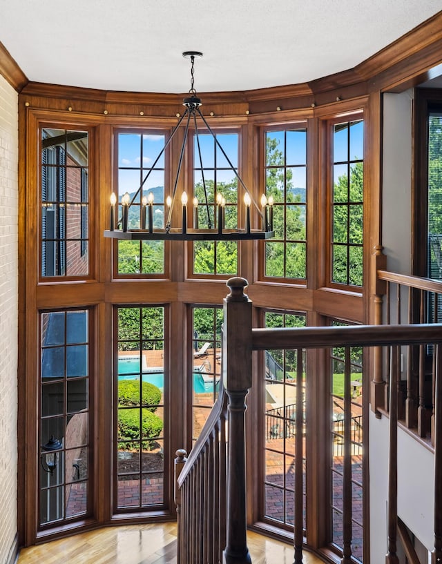 1442 Darbee Dr, Morristown, TN 37814 - doorway featuring a chandelier, wood finished floors, and healthy amount of natural light