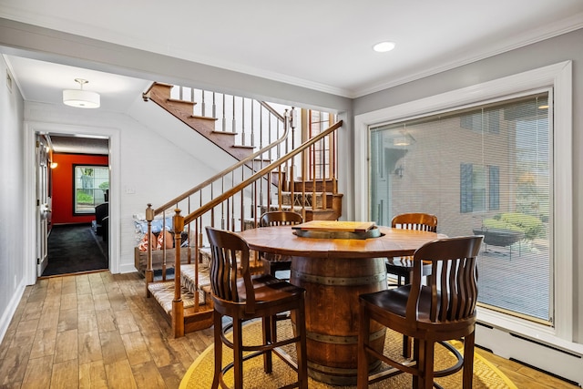 1442 Darbee Dr, Morristown, TN 37814 - dining space with light wood-type flooring, baseboard heating, stairs, and ornamental molding