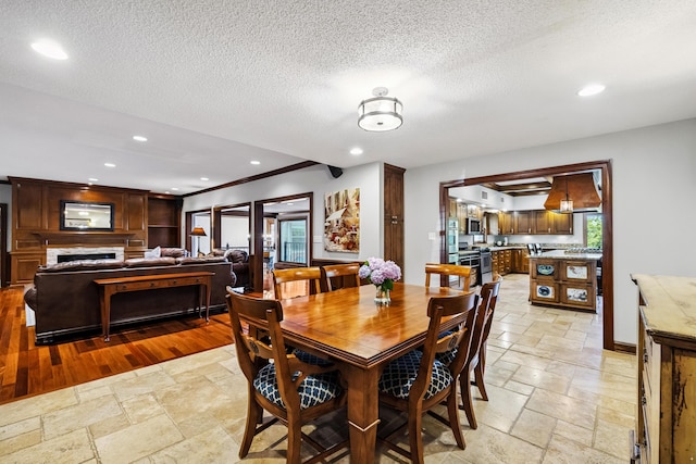1442 Darbee Dr, Morristown, TN 37814 - dining area with stone tile floors, healthy amount of natural light, a textured ceiling, and recessed lighting