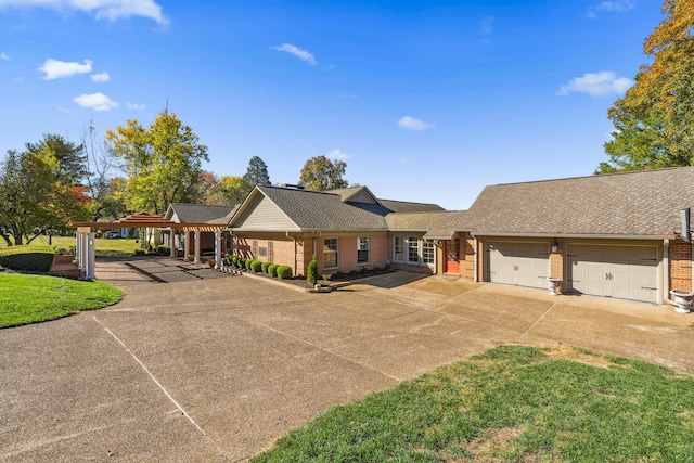 1442 Darbee Dr, Morristown, TN 37814 - single story home with brick siding, concrete driveway, an attached garage, roof with shingles, and a front lawn