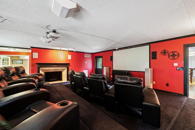 1442 Darbee Dr, Morristown, TN 37814 - carpeted cinema featuring a fireplace, a textured ceiling, and ornamental molding