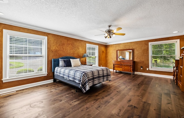 1442 Darbee Dr, Morristown, TN 37814 - bedroom with crown molding, dark wood-type flooring, a textured ceiling, and ceiling fan