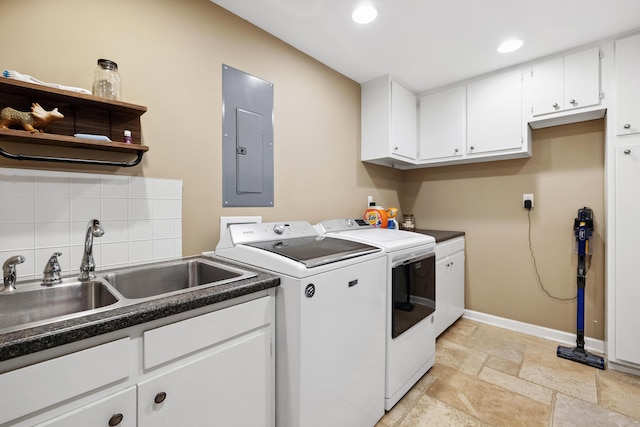 1442 Darbee Dr, Morristown, TN 37814 - washroom featuring electric panel, washing machine and dryer, cabinet space, stone tile floors, and recessed lighting