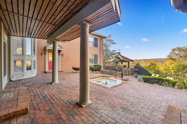 1442 Darbee Dr, Morristown, TN 37814 - view of patio with an in-ground hot tub and a gazebo