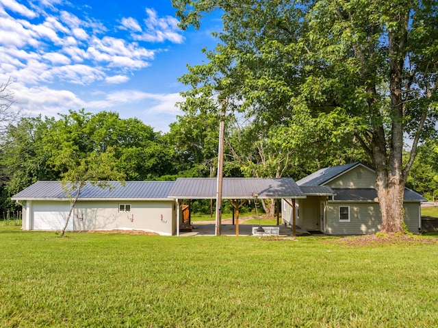 3569 Leadvale Rd, White Pine, TN 37890 - ranch-style house with a front lawn, metal roof, and view of wooded area