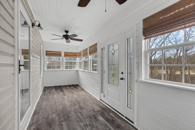 unfurnished sunroom with wooden ceiling and ceiling fan