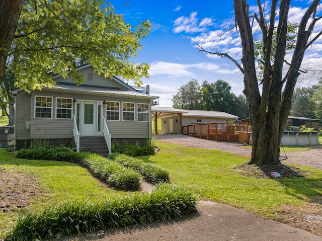 3569 Leadvale Rd, White Pine, TN 37890 - view of front facade with entry steps, a front yard, a deck, and driveway