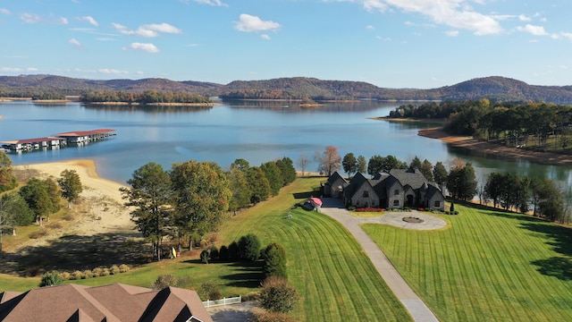 bird's eye view with a water and mountain view