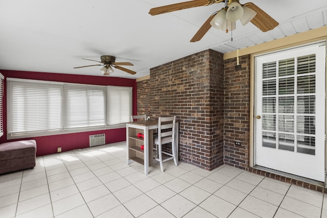 unfurnished sunroom with radiator