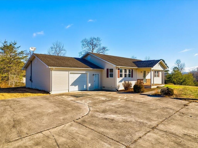 ranch-style home featuring a garage