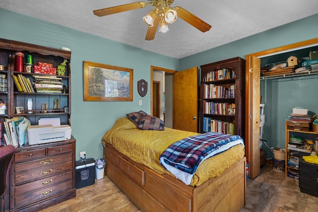 822 Osprey Dr, Morristown, TN 37814 - bedroom with a textured ceiling, a closet, and ceiling fan