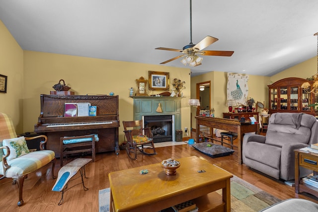822 Osprey Dr, Morristown, TN 37814 - living area featuring a ceiling fan, wood finished floors, and a fireplace with flush hearth
