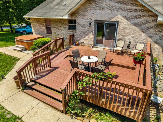 822 Osprey Dr, Morristown, TN 37814 - deck with a hot tub and outdoor dining space