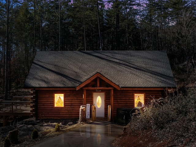 view of log cabin