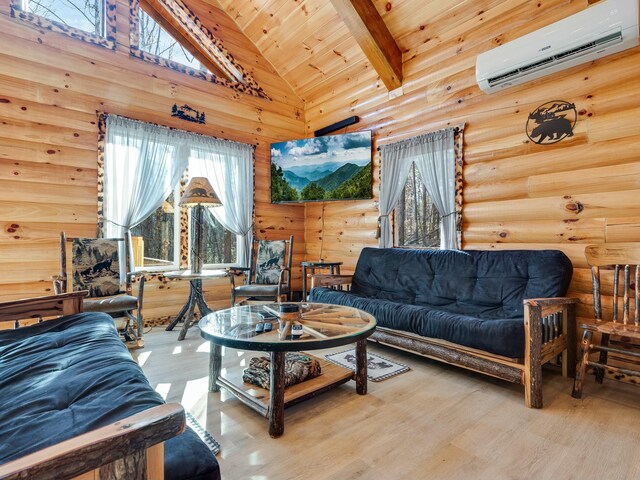 living room with wood ceiling, hardwood / wood-style floors, a wall unit AC, high vaulted ceiling, and log walls