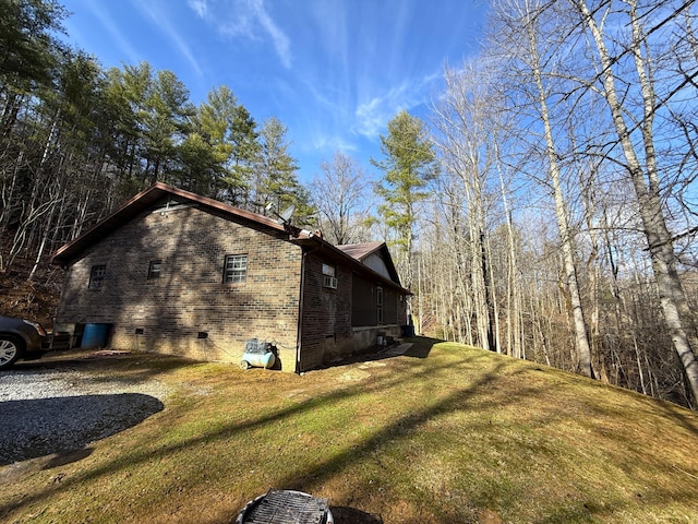 view of property exterior featuring a yard