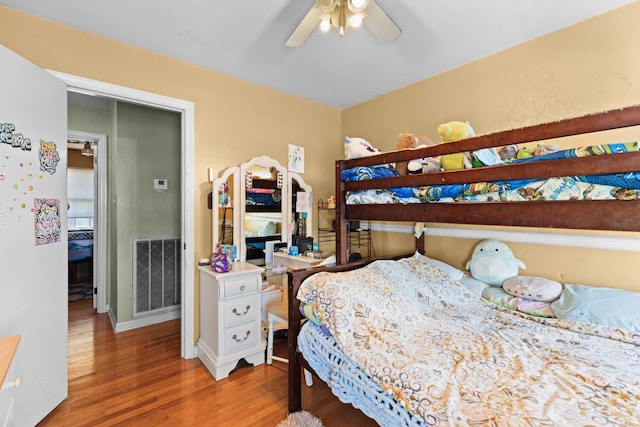 bedroom featuring ceiling fan and wood-type flooring