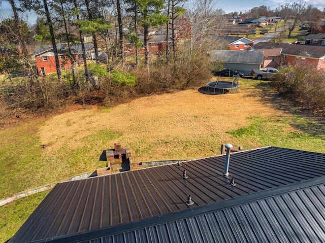 view of yard featuring a trampoline