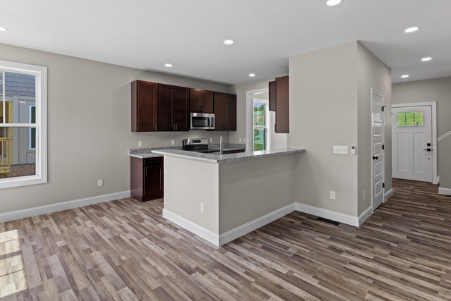3183 Bridgewater Blvd, Morristown, TN 37814 - kitchen with recessed lighting, light wood-style flooring, baseboards, and stainless steel appliances