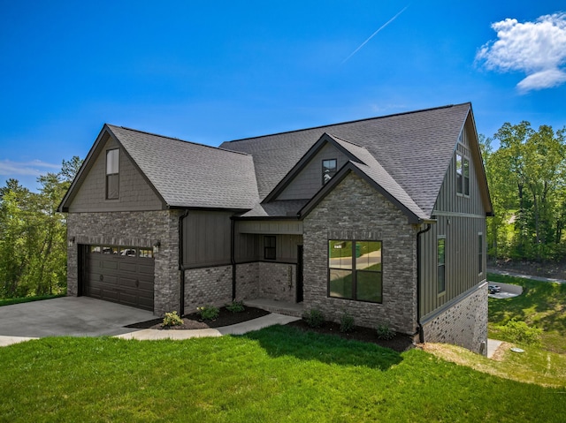 craftsman inspired home featuring a front lawn, stone siding, a shingled roof, an attached garage, and driveway