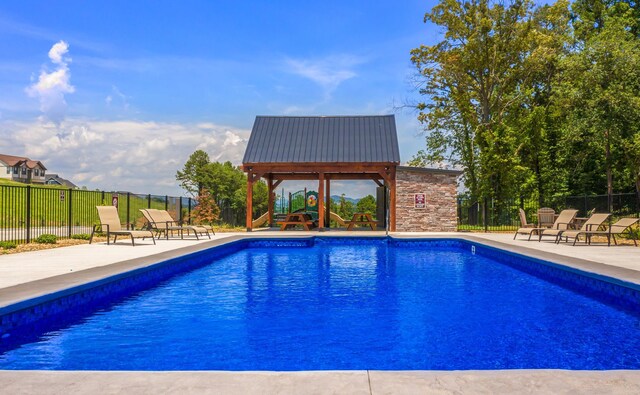 3183 Bridgewater Blvd, Morristown, TN 37814 - view of swimming pool featuring a fenced in pool, fence, and a patio