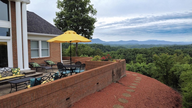 1564 Tranquility Trl, Dandridge, TN 37725 - view of patio / terrace featuring a mountain view, a view of trees, and an outdoor living space